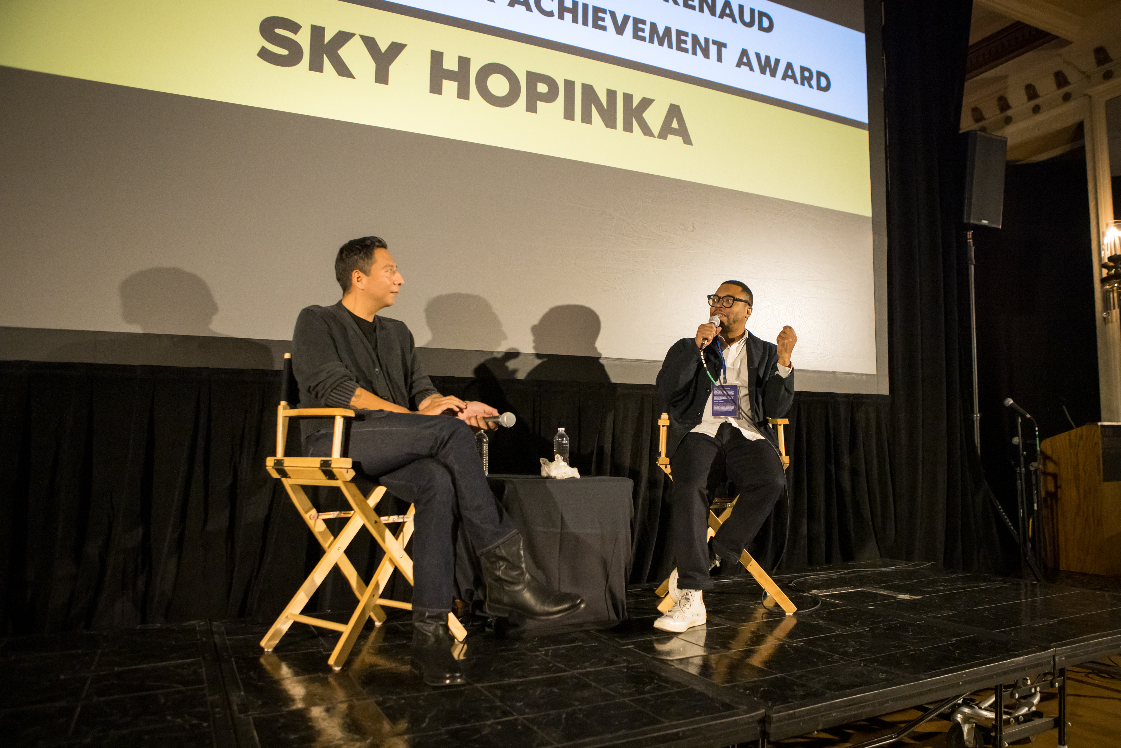 Photograph of Sky Hopinka (left) and Jon Sesrie-Goff (right) in conversation, at HSDFF. Image credit: Aaron Brewer. Courtesy of HSDFF