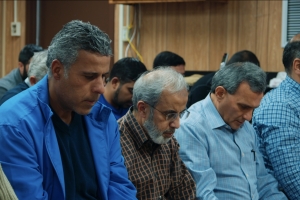 Attendees of the Victoria Islamic Center pray in a temporary building after an arson destroys their mosque.